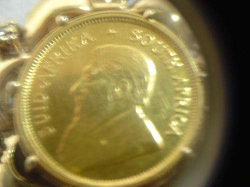 22 ct Gold 1/10th Krugerrand mounted in 9ct gold mount with Diamonds