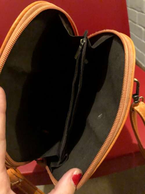 Lovely orange leather sling handbag