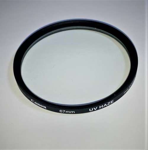 Used CANON UV Filter / Lens Protector for lens with 67mm Filter Thread