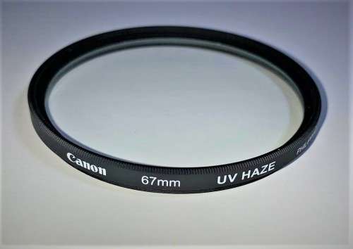 Used CANON UV Filter / Lens Protector for lens with 67mm Filter Thread
