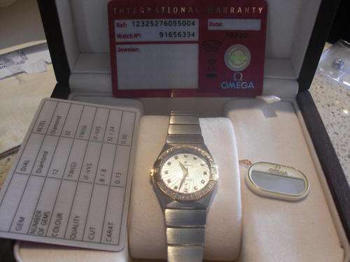 Ladies steel and 18K gold Omega Constellation quartz with diamonds on dial and bezel