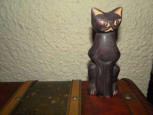 Wooden cat engraved face, paws and tail