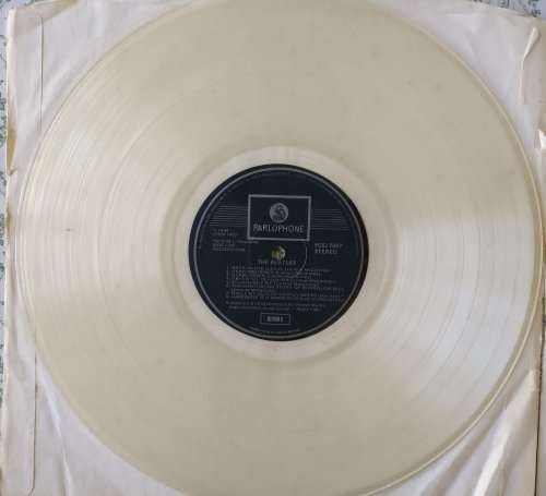 The Beatles White Album, the vinyl double album - LPs in very good condition but no sleeve.