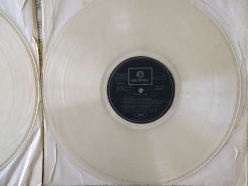 The Beatles White Album, the vinyl double album - LPs in very good condition but no sleeve.