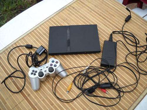 Slimline PS2 Console and 1  Dual shock controller BID TO WIN!!!!