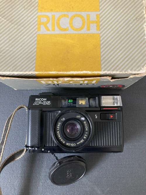 2 boxed point and shoot film cameras Ricoh Chinon