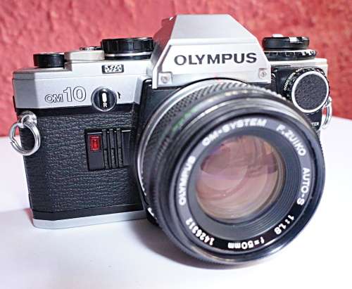 Olympus OM10 35mm SLR with lenses + PS200 Flash + UV filters etc