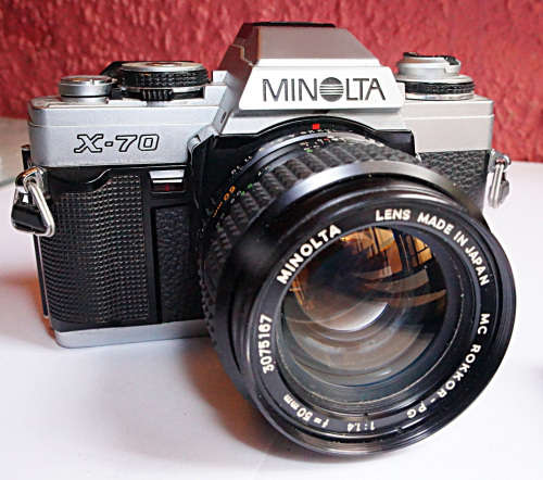 Minolta X-70 35mm SLR + Rokkor 50mm FAST f1.4 lens + 28mm f2.8 wide-angle lens + 2x converter