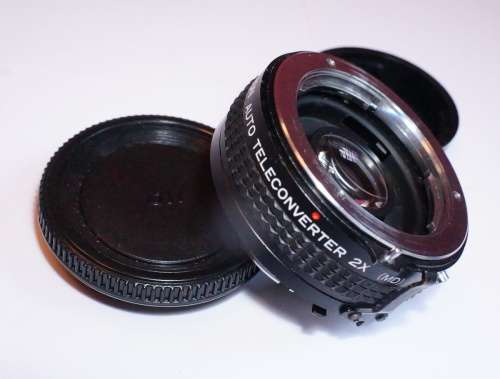 Minolta X-70 35mm SLR + Rokkor 50mm FAST f1.4 lens + 28mm f2.8 wide-angle lens + 2x converter