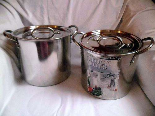 TWO STOCK POTS WITH LIDS, 5.5 litre & 7 litre