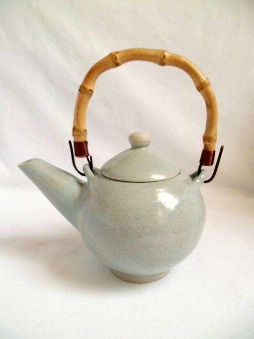 REDUCED BY 50 %! VINTAGE SMALL SIGNED POTTERY TEAPOT WITH DETACHABLE BAMBOO HANDLE SIGNED *ALI*