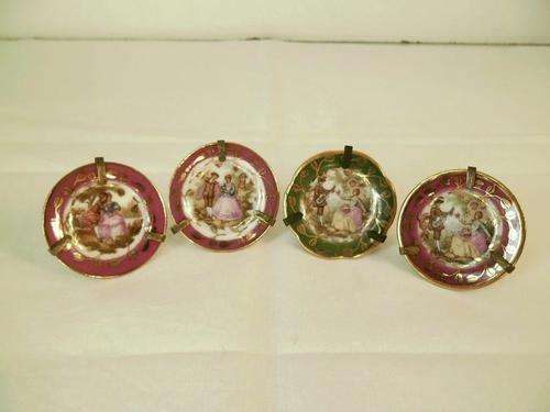 FOUR LOVELY VINTAGE MINI LIMOGES PLATES IN BRASS FRAMES, MADE IN FRANCE, ALL FOR ONE BID