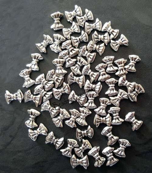 CHARM SPACERS - ANTIQUE SILVER - BOWKNOT - 8x6mm