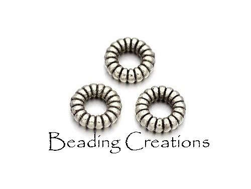 SPACERS - CONNECTORS - RINGS - ANTIQUE SILVER - DONUT - 5x2mm - 10 PCS