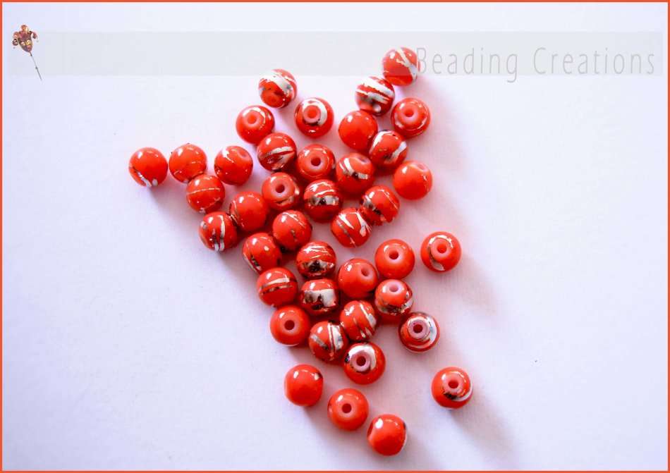 GLASS BEADS - ORANGE AND SILVERFOIL - 8mm