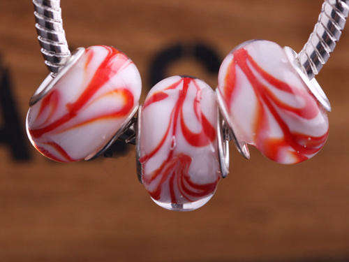 EUROPEAN STYLE - 925 SILVER CORE - MURANO GLASS BEADS - CLEAR, INNER RED & HINT OF ORANGE PATTERN