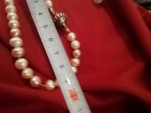 Freshwater pearl necklace and earrings.