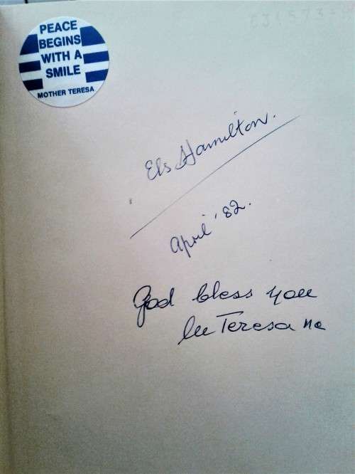 TWO TITLES SIGNED BY MOTHER TERESA