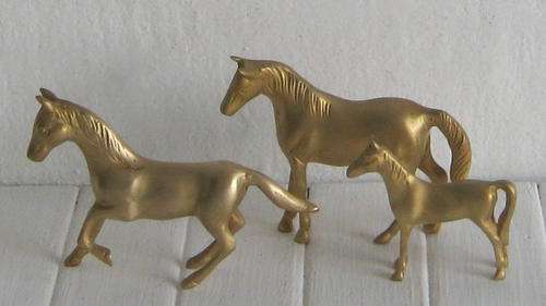 THREE BRASS ORNAMENTAL HORSES