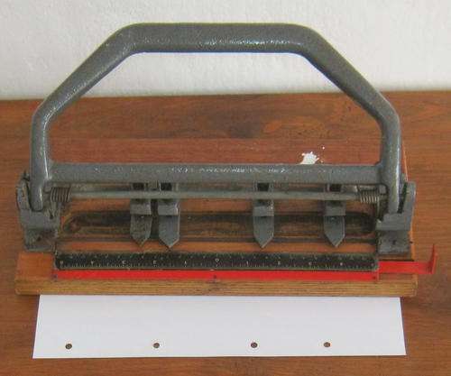 VINTAGE PUNCH - OLD AND HEAVY ADJUSTABLE PUNCH