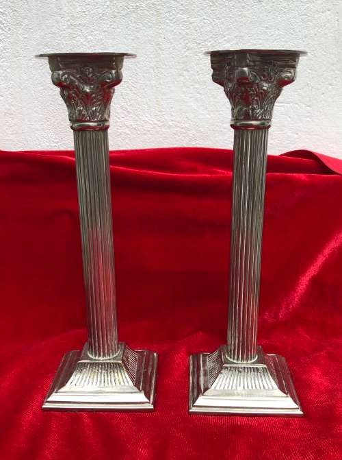 SILVER PLATED CANDLESTICKS heavy and tall