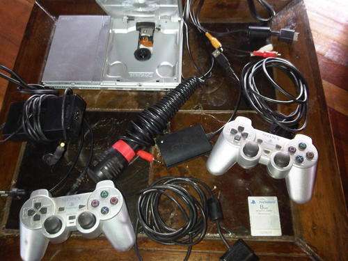 Play station 2 silver slim!!!!!!! Great Price!! Must go ASAP!!!!