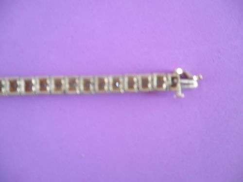 Yellow gold and diamond tennis bracelet