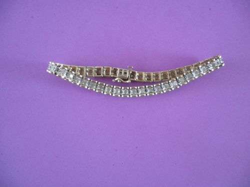 Yellow gold and diamond tennis bracelet