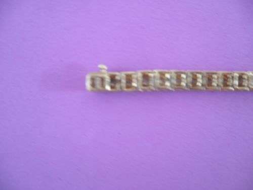 Yellow gold and diamond tennis bracelet